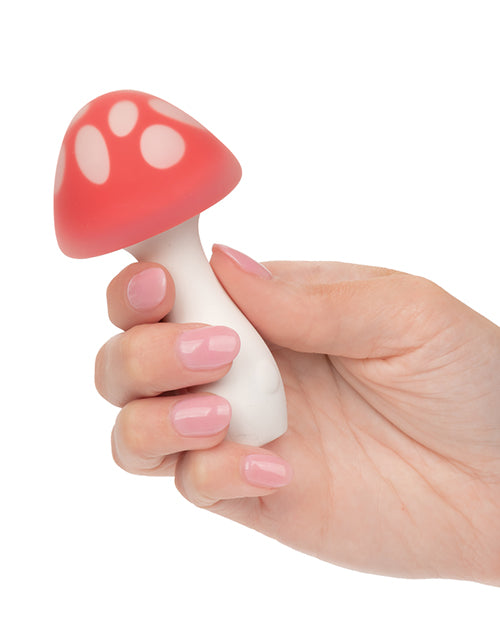 Compact red and white mushroom-shaped massager made from body-safe silicone