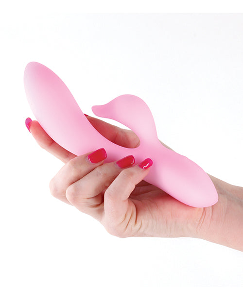 Pure - Dawn vibrator held in hand, showcasing its sleek and ergonomic design