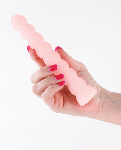 Pure Joy Vibrator showing its smooth, velvety silicone surface and elegant contours